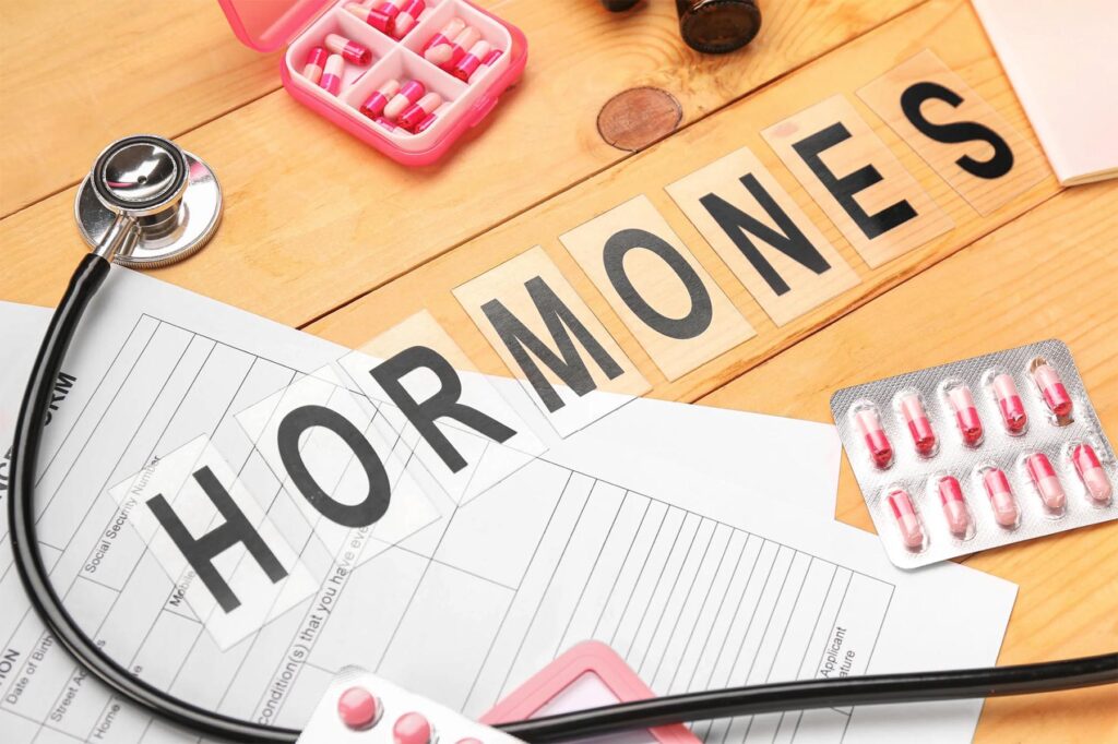 Common symptoms of hormonal imbalance, including fatigue, mood swings, weight gain, and sleep issues