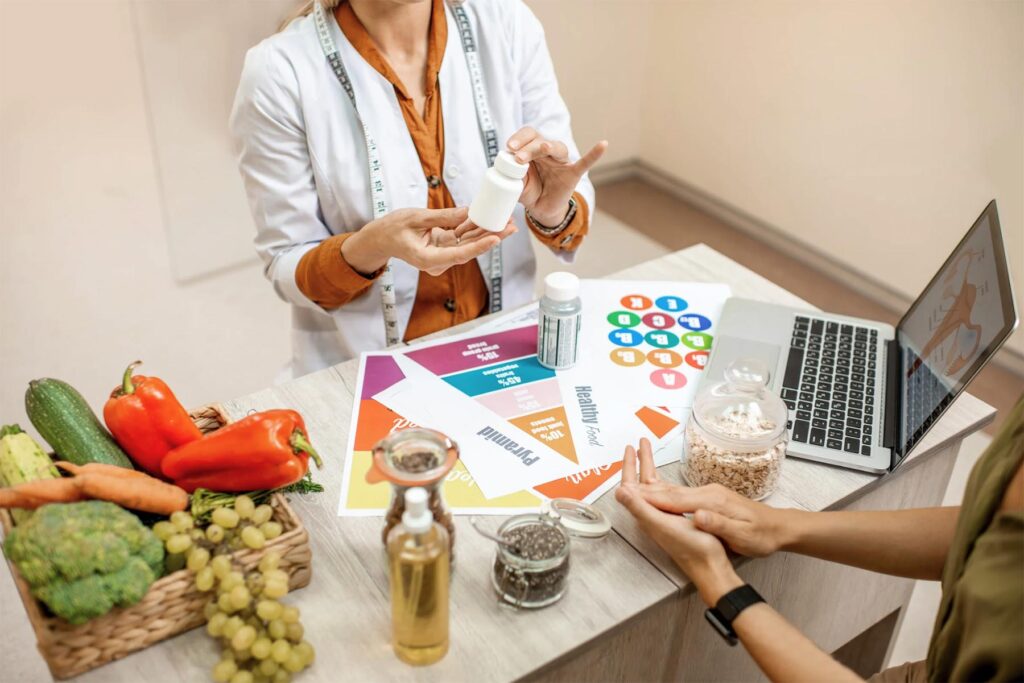 Screenshot Nutritionist discussing personalized nutrition plans with client at Higher Health Clinic in Toronto